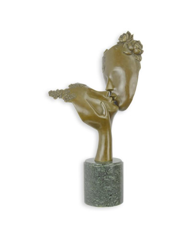 Bronzen beeld twee kussende gezichten Bronzen beeld twee kussende gezichten