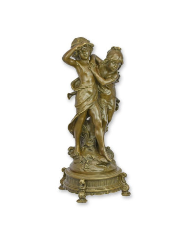 Bronzen jongen en meisje beeld