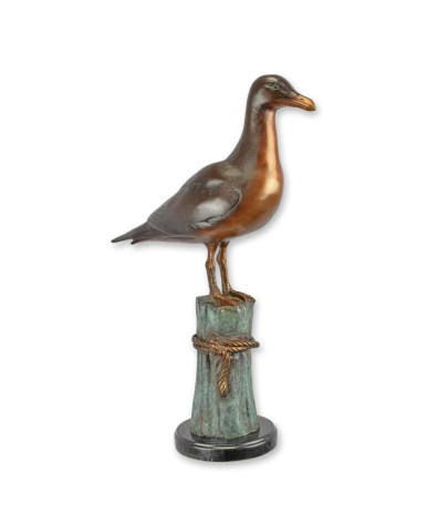 Bronzen meeuw op meerpaal beeld
